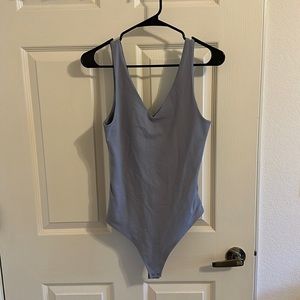 Light blue double lined bodysuit.